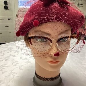 Netted wine colored hat n veil. Vintage READ DESCRIPTION